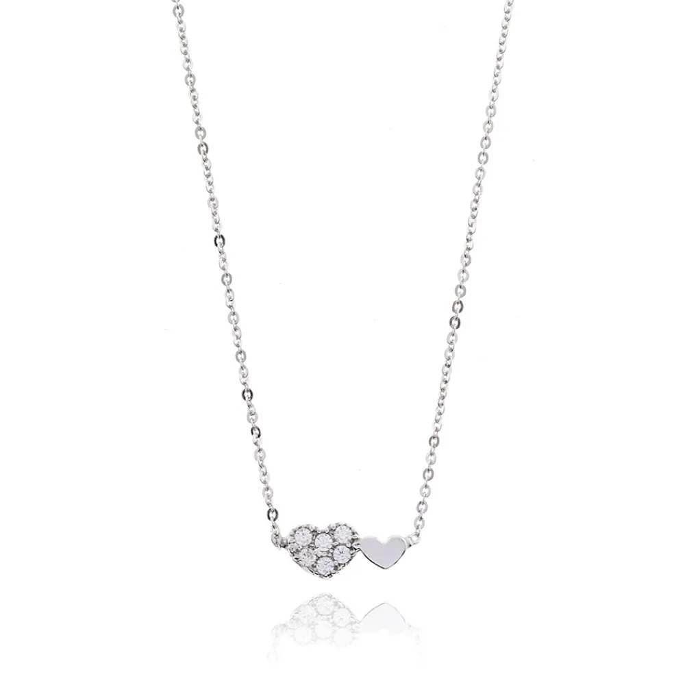 collana_colore_bianco_con_0-21.webp FACCO COLLANA colore Bianco con zirconi Simbolo: CUORE "I sentimenti raccontati dall?Anima"